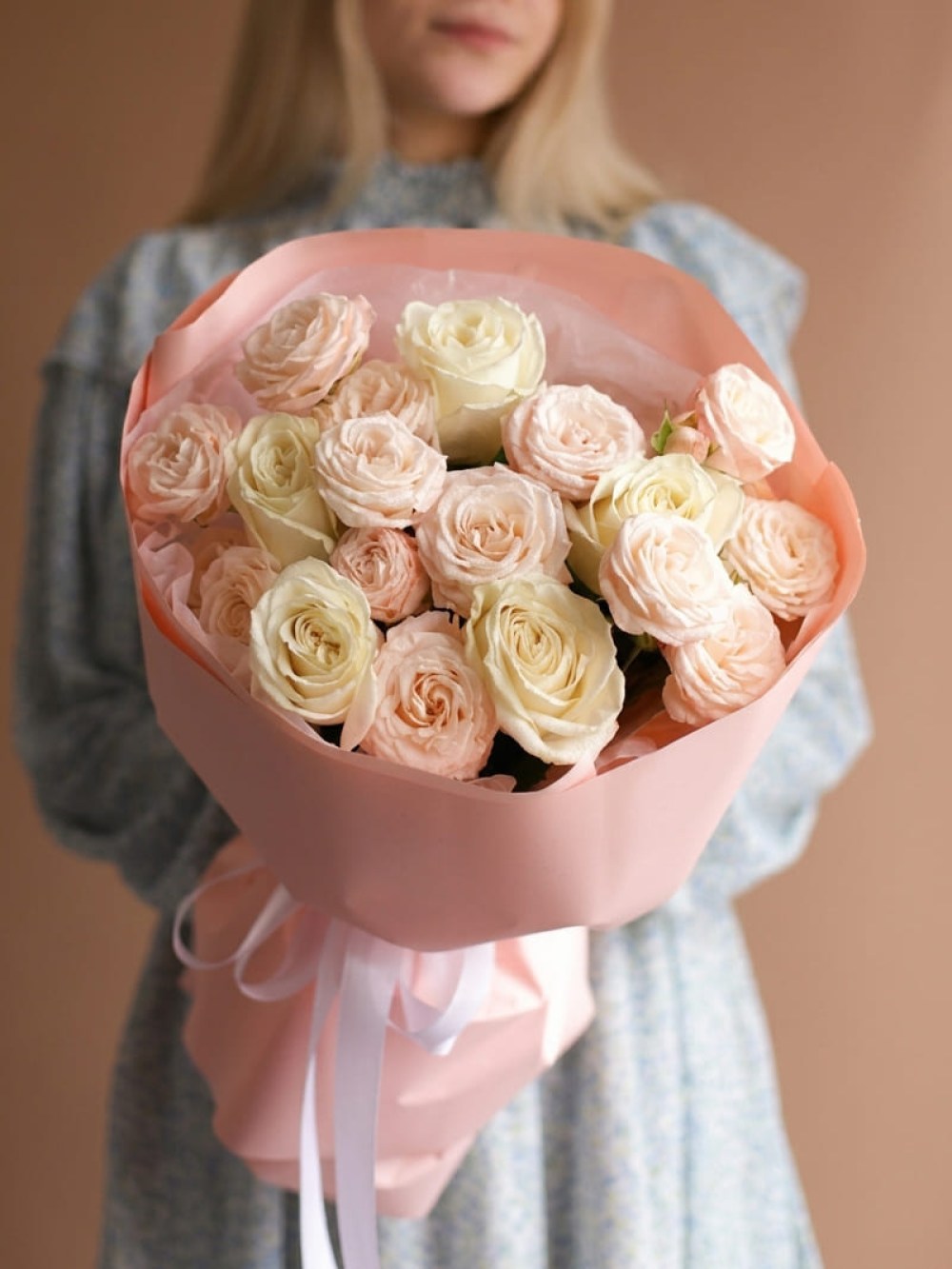 Bouquet of white roses and spray garden roses