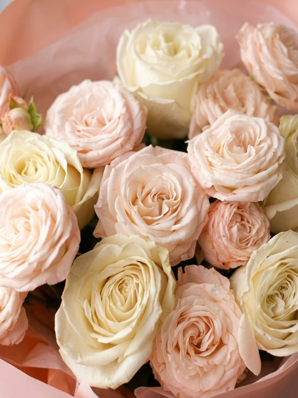Bouquet of white roses and spray garden roses