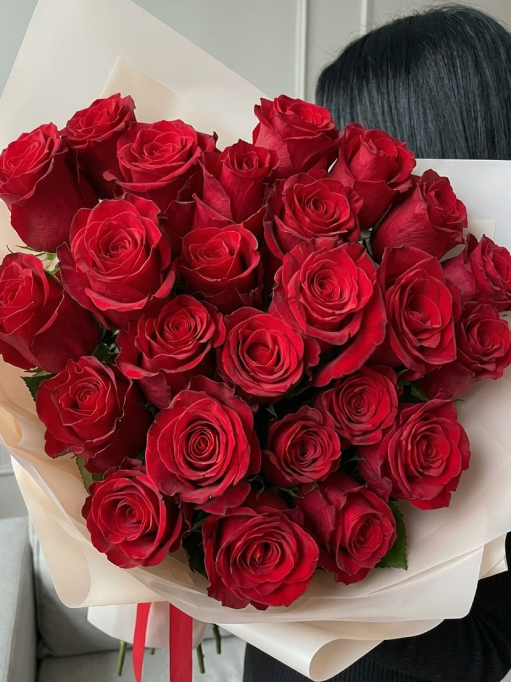 Bouquet of 25 red roses in light wrapping