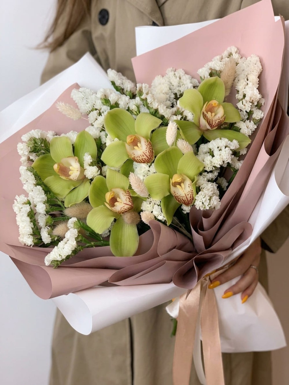 Bouquet with green orchids and statice